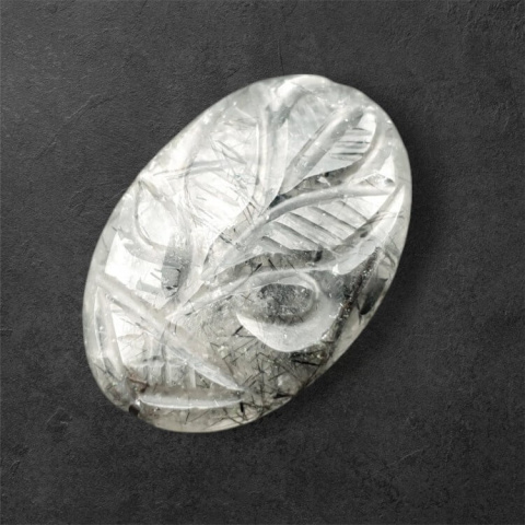 Quartz with tourmaline cabochon carving 27x19 mm no. 64 Quartz with tourmaline cabochon carving 27x19 mm no. 64