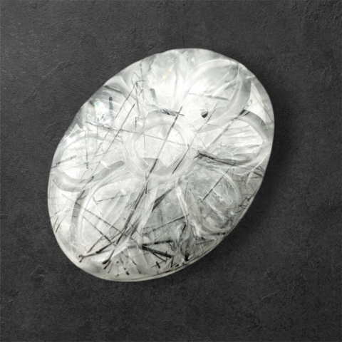 Quartz with tourmaline cabochon carving 27x20 mm no. 38 Quartz with tourmaline cabochon carving 27x20 mm no. 38