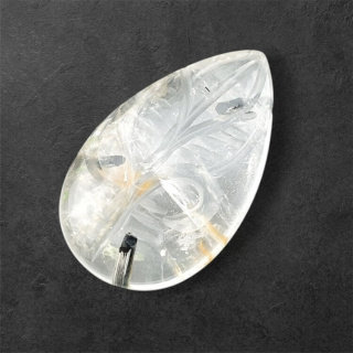 Quartz with tourmaline cabochon carving 28x17 mm no. 41