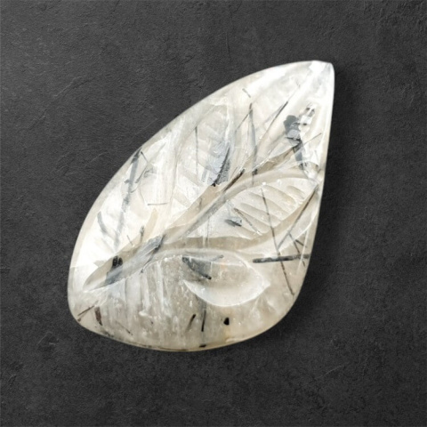 Quartz with tourmaline carved cabochon 30x18 mm no 67 Quartz with tourmaline carved cabochon 30x18 mm no 67