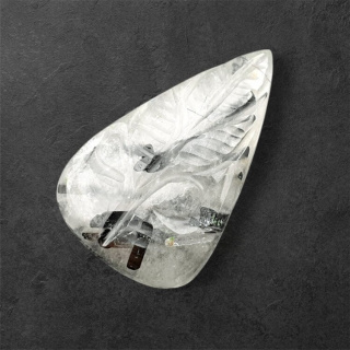 Kwarc z turmalinem kaboszon carving 30x18 mm nr 7