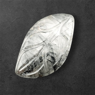 Quartz with tourmaline carved cabochon 31x18 mm no 50