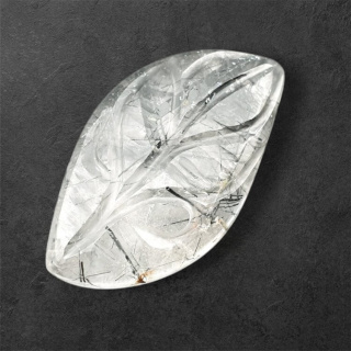 Quartz with tourmaline carved cabochon 31x18 mm no 50