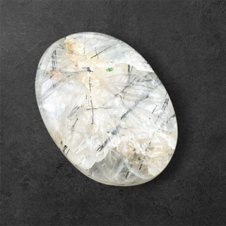 Quartz with tourmaline carved cabochon 32x23 mm no 3