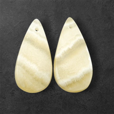 Żółty aragonit para kaboszonów z dziurką 26x13 mm nr P952 Żółty aragonit para kaboszonów z dziurką 26x13 mm nr P952