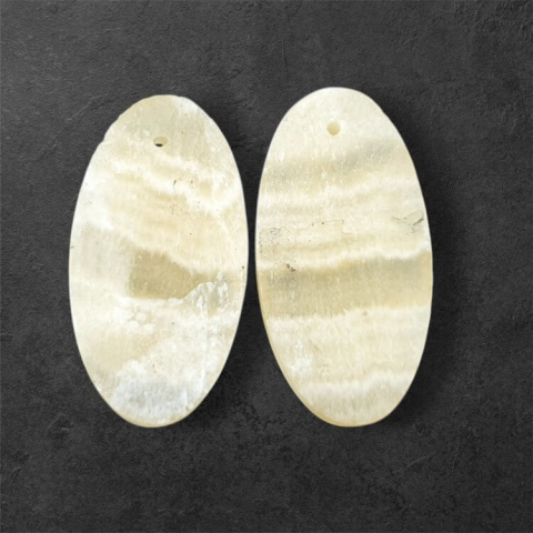 Żółty aragonit para kaboszonów z dziurką 28x14 mm nr P955 Żółty aragonit para kaboszonów z dziurką 28x14 mm nr P955