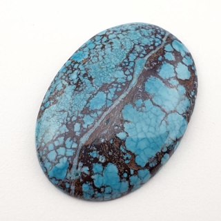Magnesite turquoise cabochon 33x23 mm no 66