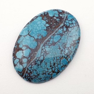 Magnesite turquoise cabochon 33x23 mm no 66
