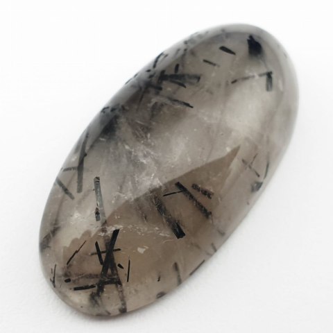 Quartz with tourmaline cabochon 3.0x1.5 cm no. 26 Quartz with tourmaline cabochon 3.0x1.5 cm no. 26