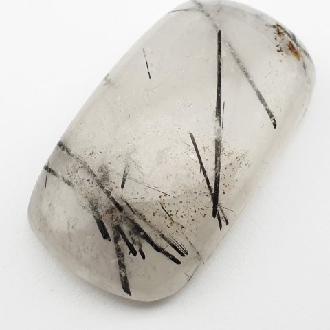 Kwarc z turmalinem kaboszon 3,9x2,2 cm nr 1 Kwarc z turmalinem kaboszon 3,9x2,2 cm nr 1