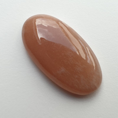 Kamień księżycowy brzoskwiniowy kaboszon 33x18 mm nr 10 Kamień księżycowy brzoskwiniowy kaboszon 33x18 mm nr 10