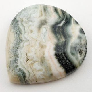 Saturn chalcedony cabochon 38x34 mm no. 22