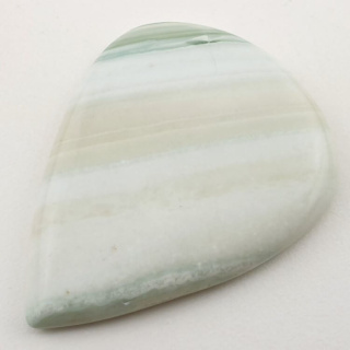 Saturn chalcedony cabochon 44x34 mm no. 20