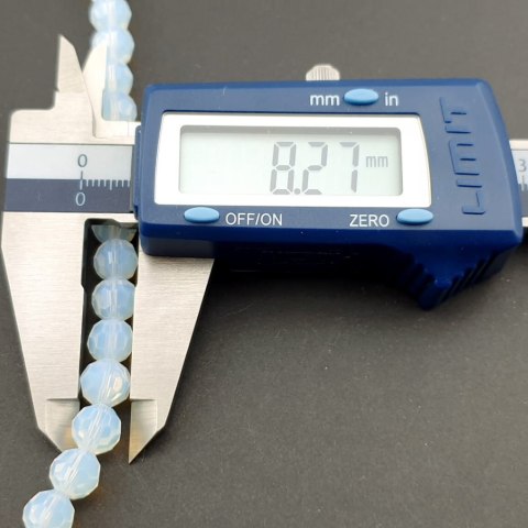 Opalite faceted ball 8 mm strand Opalite faceted ball 8 mm strand