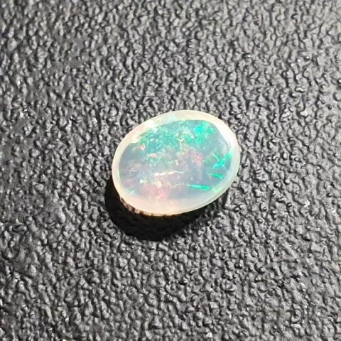 Opal from Ethiopia cabochon 9x7 mm no 336 Opal from Ethiopia cabochon 9x7 mm no 336