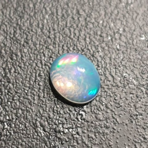 Opal from Ethiopia cabochon 9x7 mm no 337 Opal from Ethiopia cabochon 9x7 mm no 337