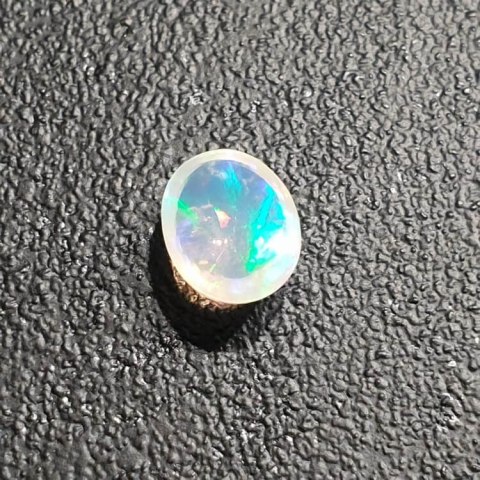Opal from Ethiopia cabochon 9x7 mm no 337 Opal from Ethiopia cabochon 9x7 mm no 337