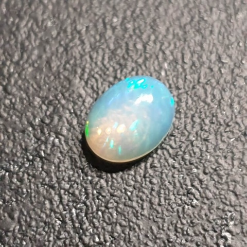Opal from Ethiopia cabochon 9x7 mm no 338 Opal from Ethiopia cabochon 9x7 mm no 338
