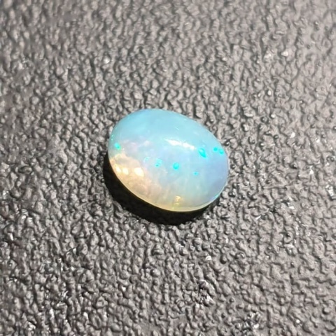 Opal from Ethiopia cabochon 9x7 mm no 338 Opal from Ethiopia cabochon 9x7 mm no 338