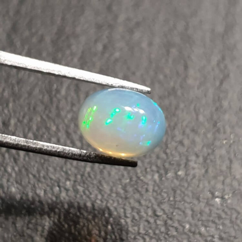 Opal from Ethiopia cabochon 9x7 mm no 338 Opal from Ethiopia cabochon 9x7 mm no 338