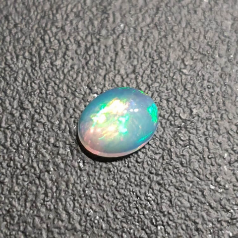 Opal from Ethiopia cabochon 9x7 mm no 341 Opal from Ethiopia cabochon 9x7 mm no 341