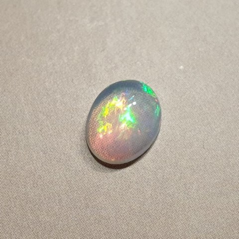 Opal from Ethiopia cabochon 9x7 mm no 341 Opal from Ethiopia cabochon 9x7 mm no 341