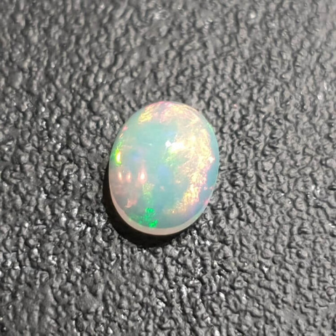 Opal from Ethiopia cabochon 9x7 mm no 349 Opal from Ethiopia cabochon 9x7 mm no 349