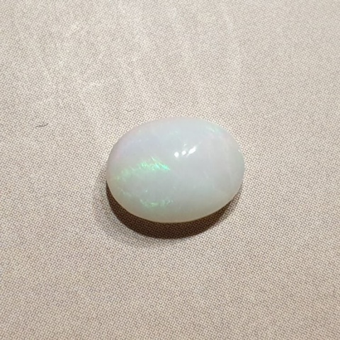 Opal from Ethiopia cabochon 9x7 mm no 350 Opal from Ethiopia cabochon 9x7 mm no 350