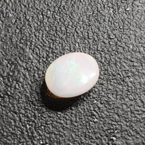 Opal from Ethiopia cabochon 9x7 mm no 350 Opal from Ethiopia cabochon 9x7 mm no 350