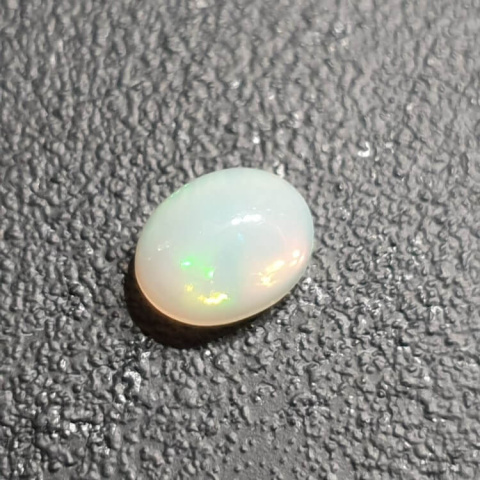 Opal from Ethiopia cabochon 9x7 mm no 352 Opal from Ethiopia cabochon 9x7 mm no 352