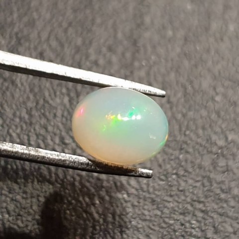 Opal from Ethiopia cabochon 9x7 mm no 352 Opal from Ethiopia cabochon 9x7 mm no 352