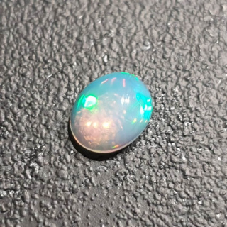 Opal from Ethiopia cabochon 9x7 mm no 354