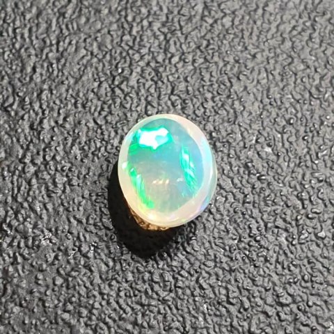 Opal from Ethiopia cabochon 9x7 mm no 354 Opal from Ethiopia cabochon 9x7 mm no 354