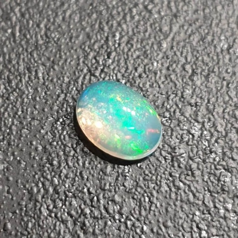Opal from Ethiopia cabochon 9x7 mm no 356 Opal from Ethiopia cabochon 9x7 mm no 356