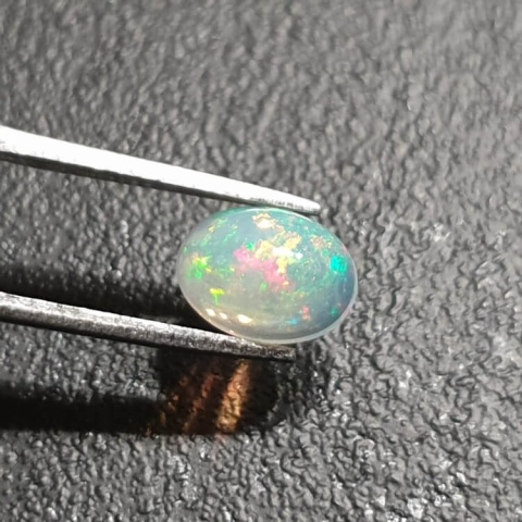 Opal from Ethiopia cabochon 9x7 mm no 356 Opal from Ethiopia cabochon 9x7 mm no 356