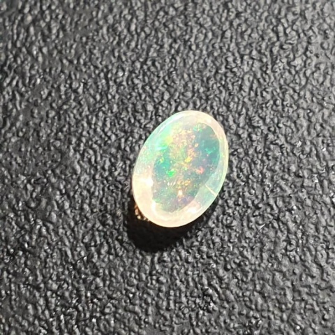 Opal from Ethiopia cabochon 9x7 mm no 356 Opal from Ethiopia cabochon 9x7 mm no 356