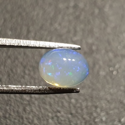 Opal from Ethiopia cabochon 8x6 mm no 373 Opal from Ethiopia cabochon 8x6 mm no 373