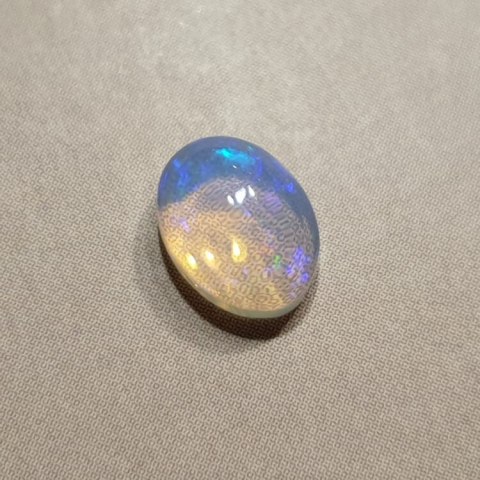 Opal from Ethiopia cabochon 8x6 mm no 373 Opal from Ethiopia cabochon 8x6 mm no 373