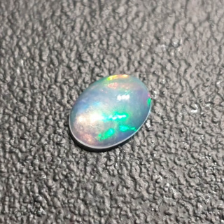Opal from Ethiopia cabochon 8x6 mm no 381