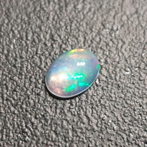 Opal from Ethiopia cabochon 8x6 mm no 381 Opal from Ethiopia cabochon 8x6 mm no 381