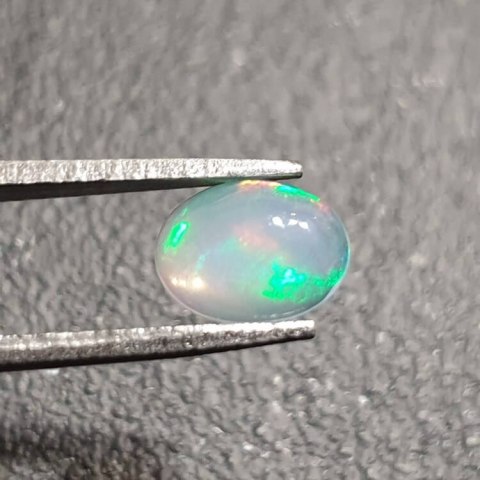 Opal from Ethiopia cabochon 8x6 mm no 381 Opal from Ethiopia cabochon 8x6 mm no 381