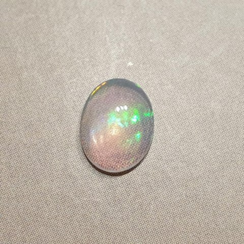 Opal from Ethiopia cabochon 8x6 mm no 381 Opal from Ethiopia cabochon 8x6 mm no 381