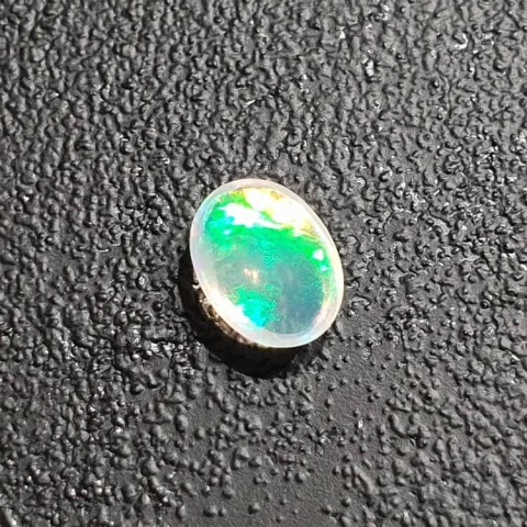 Opal from Ethiopia cabochon 8x6 mm no 381 Opal from Ethiopia cabochon 8x6 mm no 381