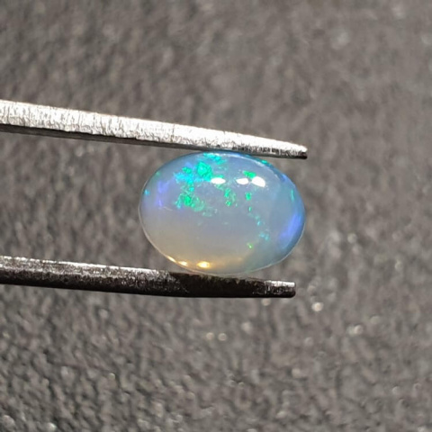 Opal from Ethiopia cabochon 8x6 mm no 383 Opal from Ethiopia cabochon 8x6 mm no 383