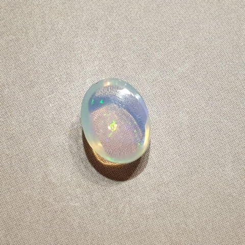 Opal from Ethiopia cabochon 8x6 mm no 383 Opal from Ethiopia cabochon 8x6 mm no 383