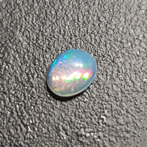 Opal from Ethiopia cabochon 8x6 mm no. 384 Opal from Ethiopia cabochon 8x6 mm no. 384