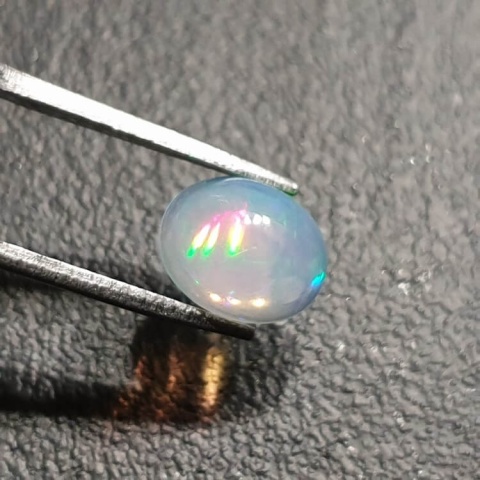 Opal from Ethiopia cabochon 8x6 mm no. 384 Opal from Ethiopia cabochon 8x6 mm no. 384