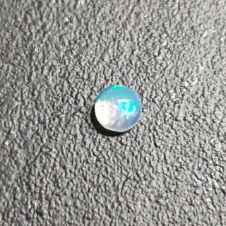 Opal from Ethiopia cabochon fi 5 mm no 487