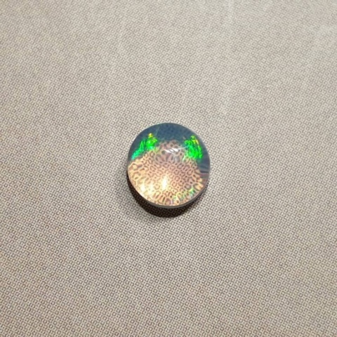 Opal from Ethiopia cabochon dia. 5 mm no 487 Opal from Ethiopia cabochon dia. 5 mm no 487