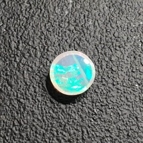 Opal from Ethiopia cabochon fi 7 mm no 420 Opal from Ethiopia cabochon fi 7 mm no 420